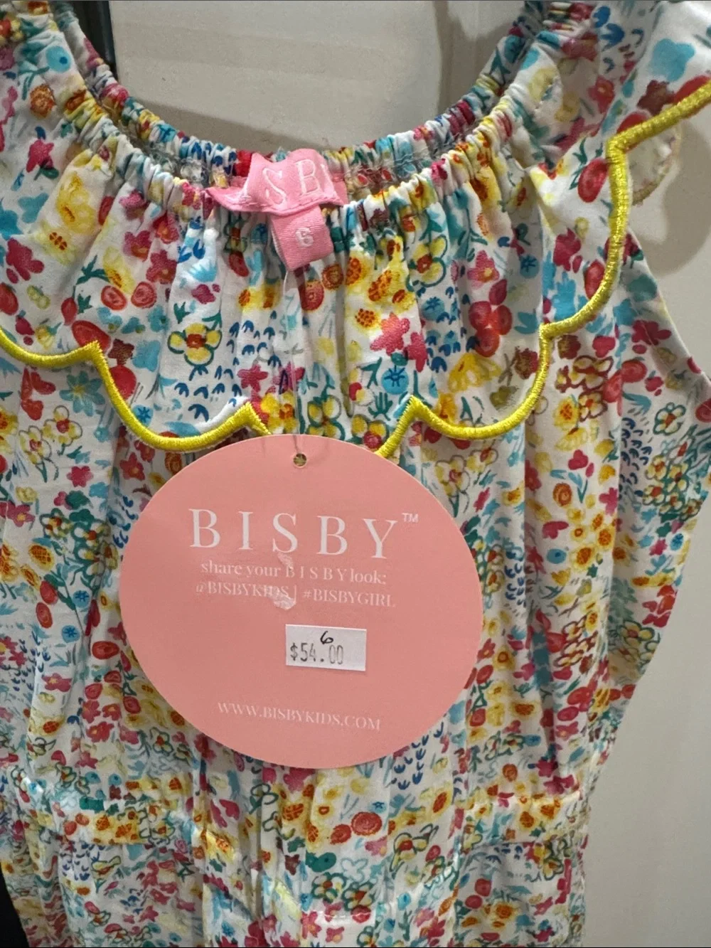 Bisby NWT size 6 Girls Floral Ruffle Romper in Yellow, Pink & Blue